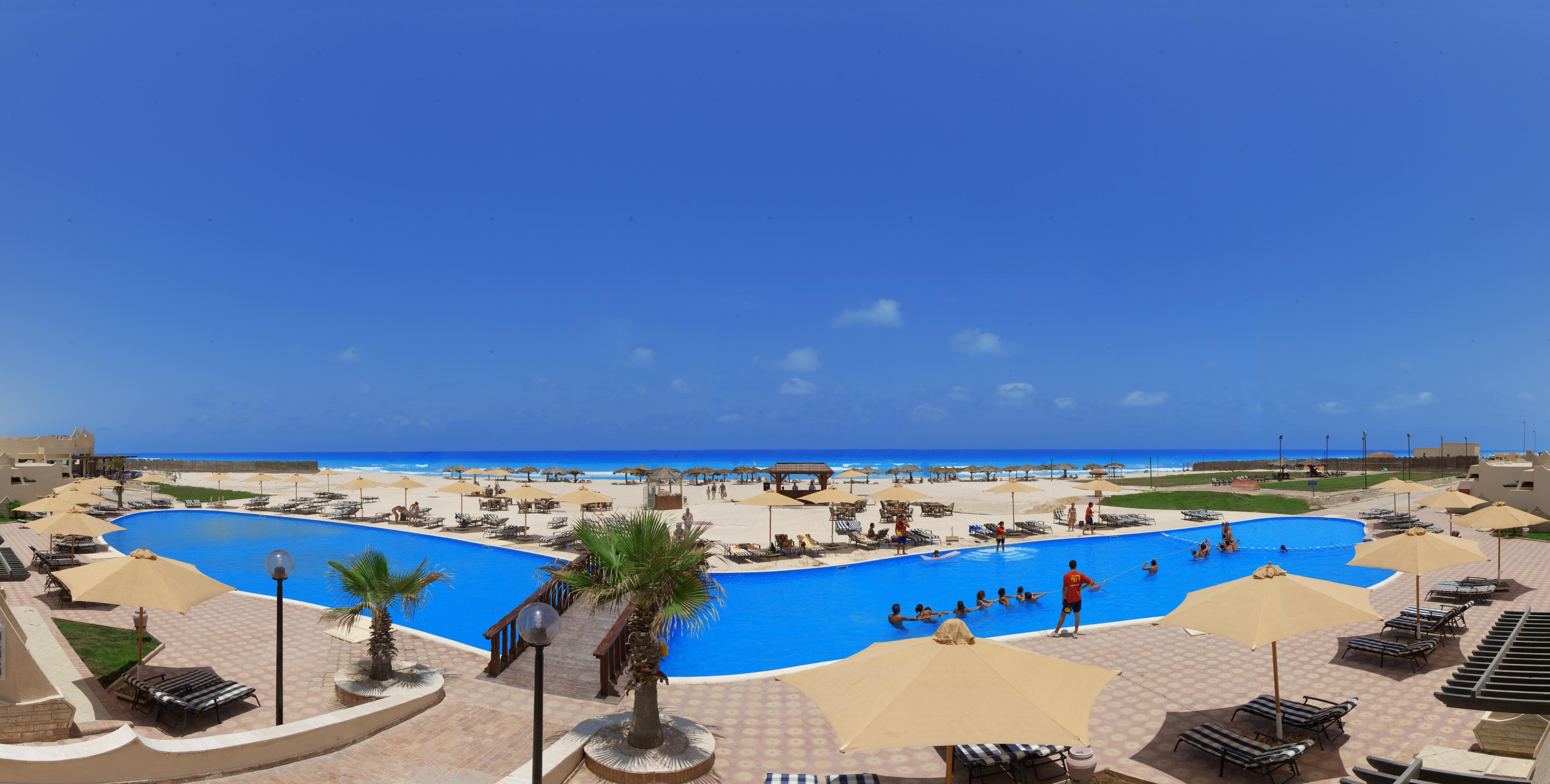 Borg El Arab Beach Resort Exteriör bild The beach at the resort