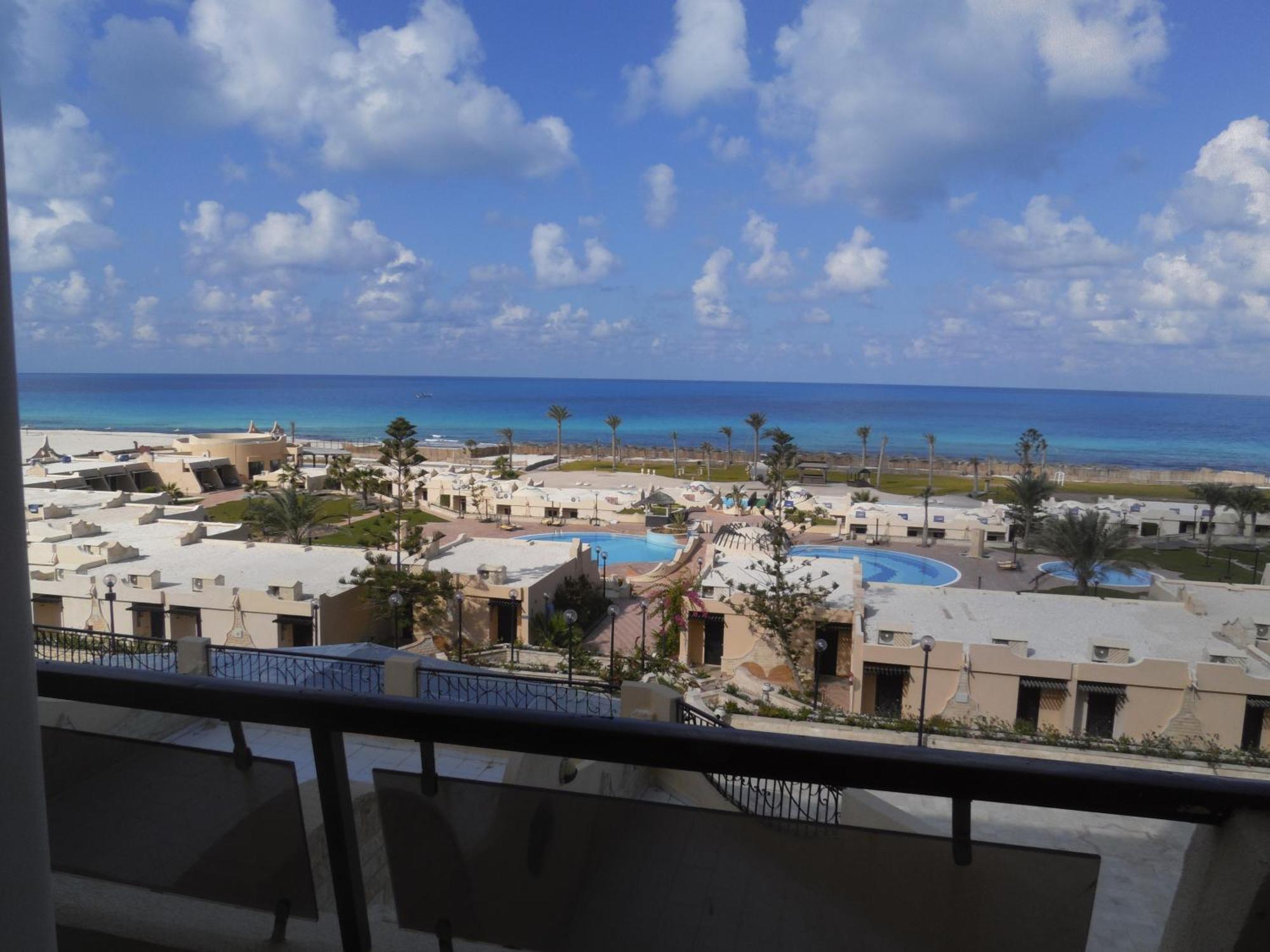 Borg El Arab Beach Resort Exteriör bild View of the beach from the hotel