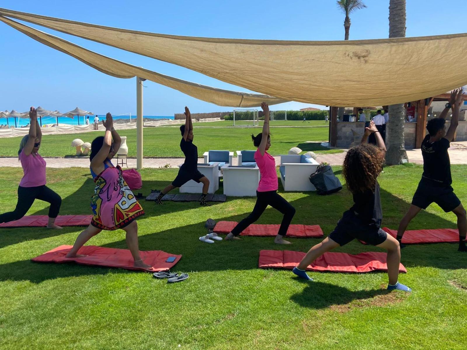 Borg El Arab Beach Resort Exteriör bild A yoga class in Egypt
