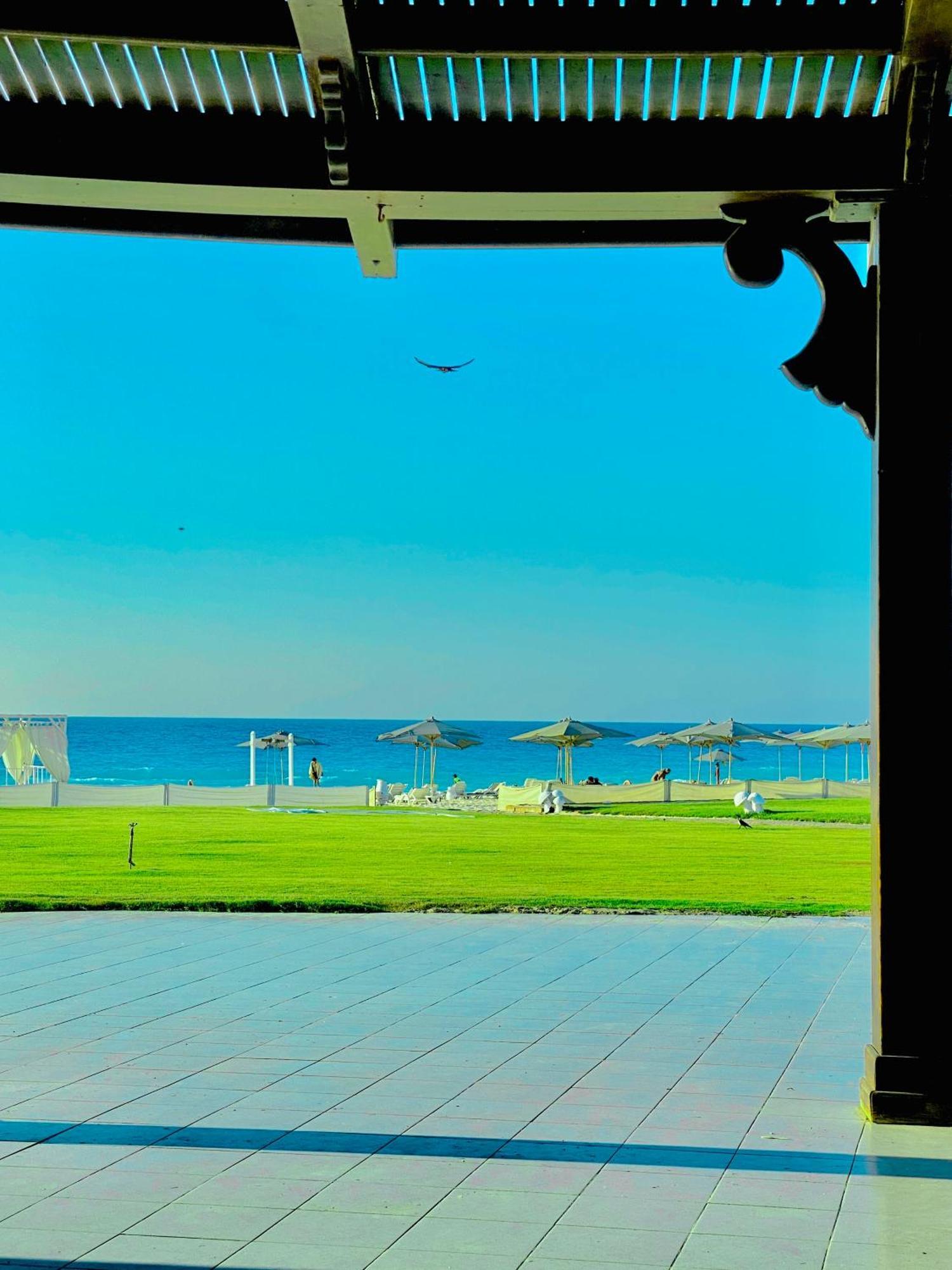 Borg El Arab Beach Resort Exteriör bild The beach at the Grand Hotel